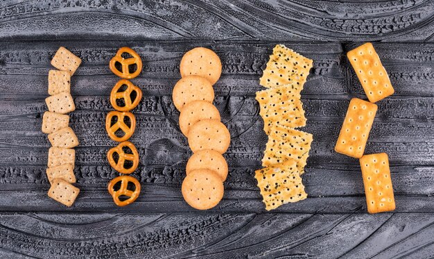 Top view of crackers on dark  horizontal