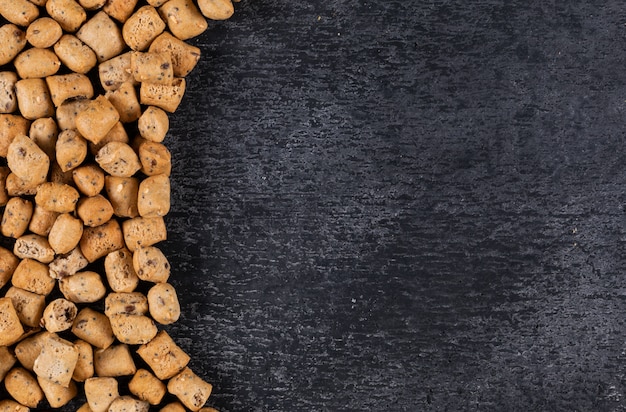 Top view of crackers texture with copy space on dark wooden  horizontal