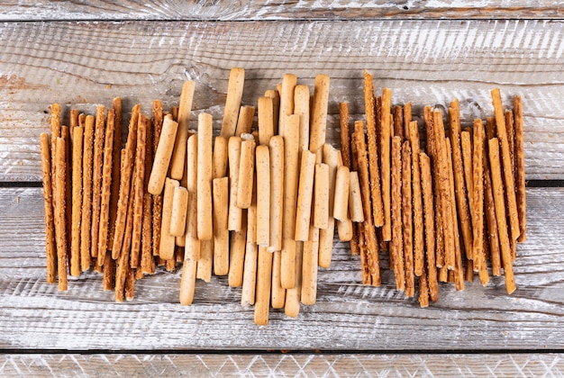 Top view of crackers on wooden  horizontal