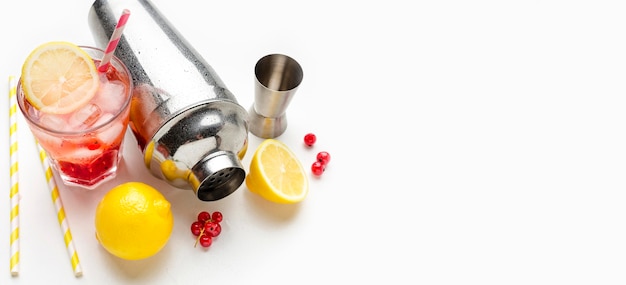 Top view cranberry vodka glasses with lemon and ice with copy-space