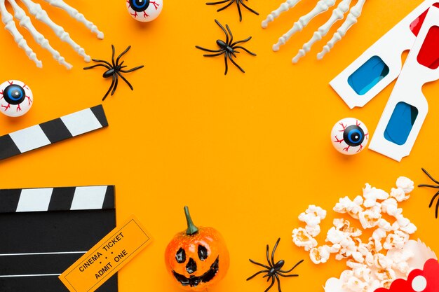 Top view creepy halloween concept with clapperboard