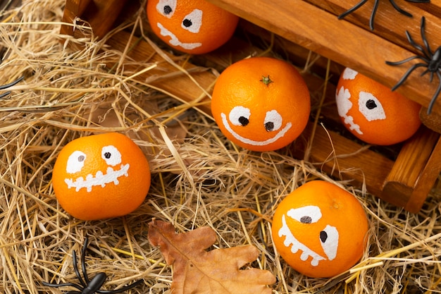 Free photo top view creepy halloween concept with pumpkins