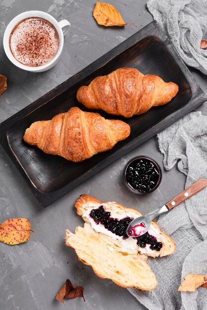 Top view of croissants and jam