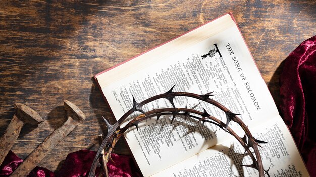 Top view crown of thorns and bible arrangement