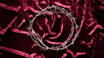 Free photo top view crown of thorns on cloth