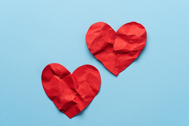 Top view crumpled paper hearts