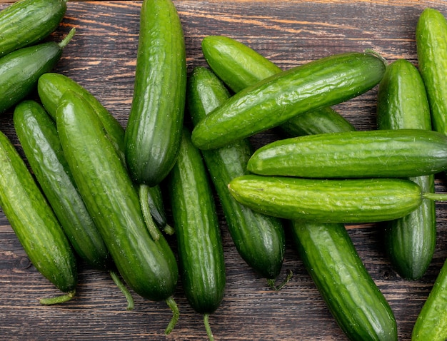 Top view cucumber on brown wooden  horizontal