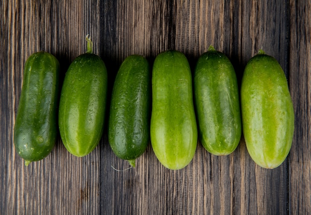 Top view of cucumbers on wood