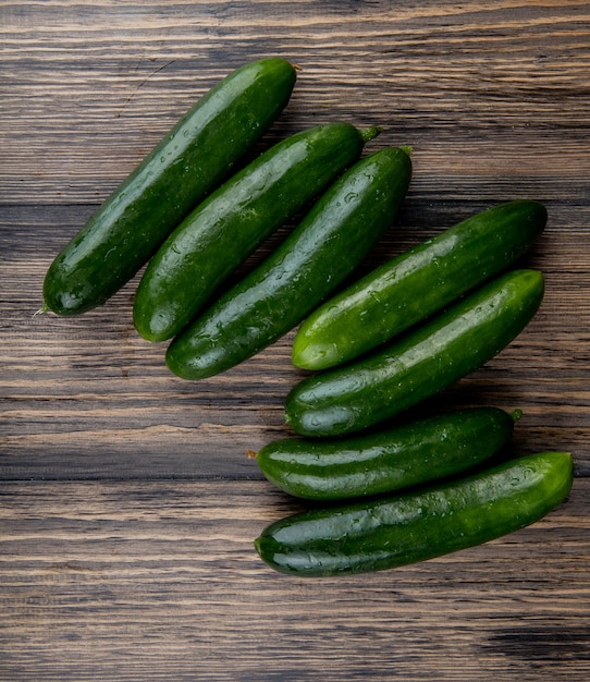 Top view of cucumbers on wood