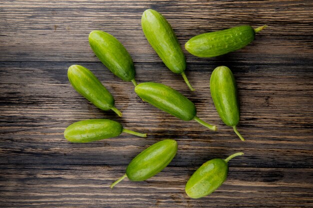 Top view of cucumbers on wood