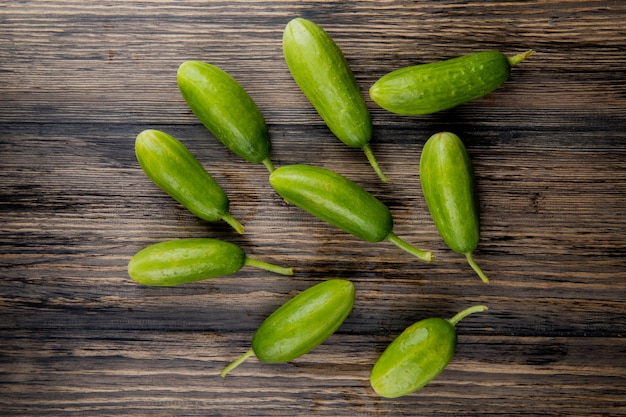 Top view of cucumbers on wood