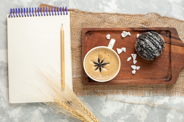 Top view cup of coffee espresso with chocolate cake on white desk chocolate cake biscuit cookie sweet