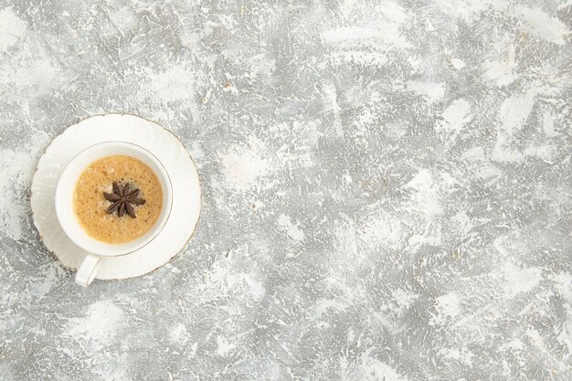 Top view cup of coffee on light-white surface