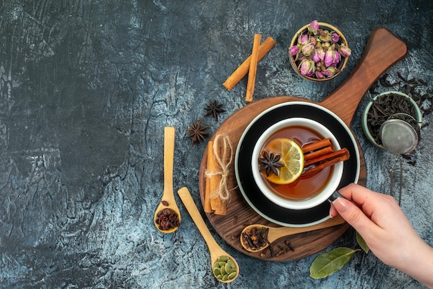 Top view cup of tea with black tea on gray background tea fruit water color ceremony photo drink breakfast