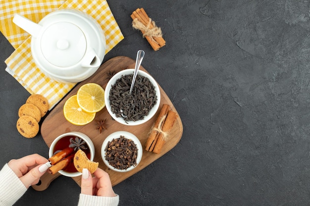 Top view cup of tea with black tea honey and lemon slices on gray background coffee egg morning breakfast family meal table free space