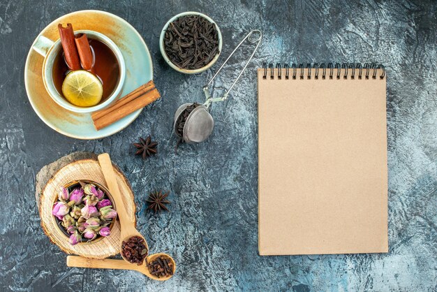 Top view cup of tea with fresh black tea on light background color drink tea fruit water ceremony photo