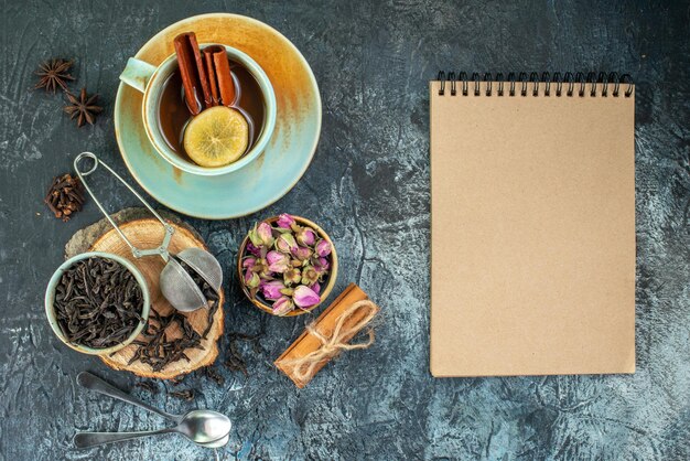 Top view cup of tea with fresh black tea on the light-gray background flavor tea coffee photo color breakfast flower ceremony