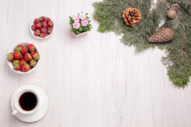 Top view cup of tea with fresh fruits on white background fruit tea berry cookie cake