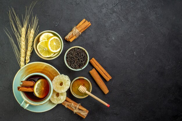 Top view cup of tea with lemon slices