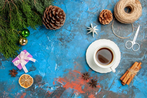 Top view cup of tea with toys