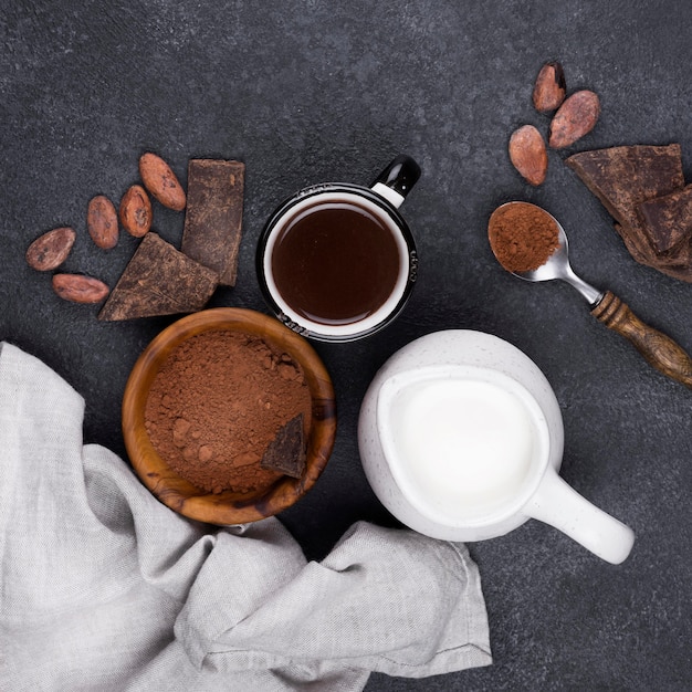 Top view cup with hot chocolate on table