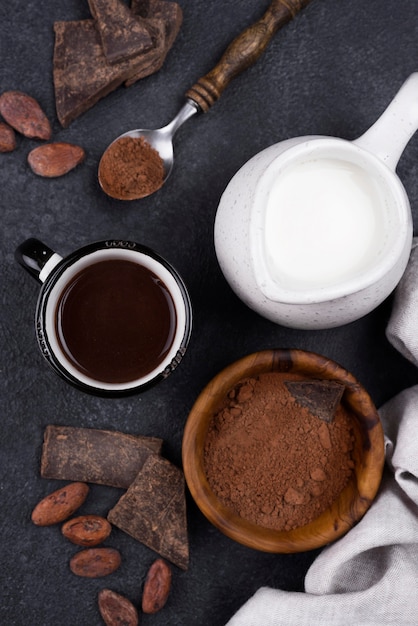 Free photo top view cup with hot chocolate with milk