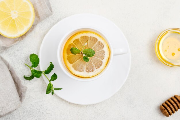 Top view cup with lemon tea