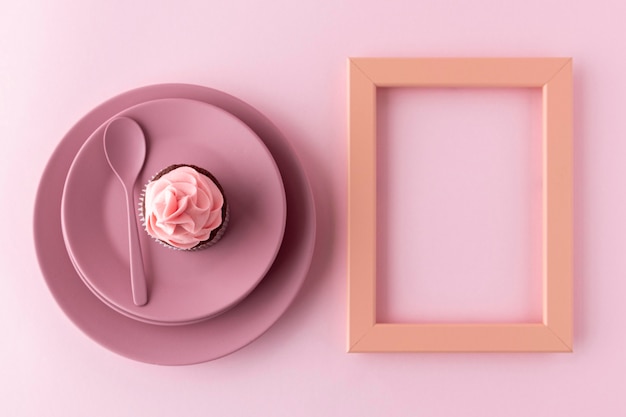 Top view cupcake on plate and frame