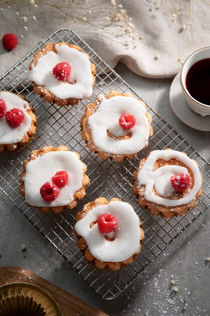 Top view cupcakes with raspberries arrangement