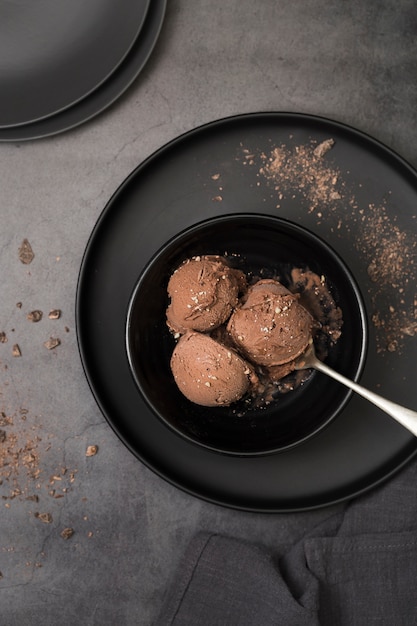 Top view cups of ice cream on plate