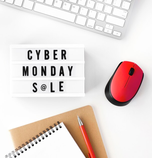 Top view of cyber monday light box with notebook and keyboard