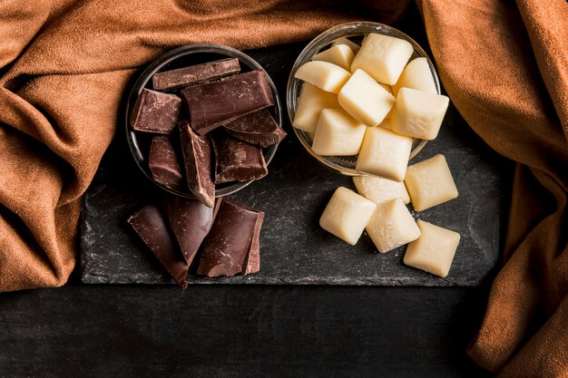 Top view dark arrangement with chocolate