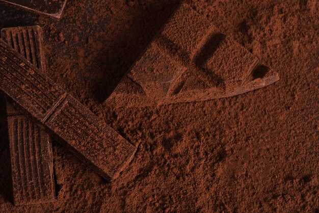 Top view of dark crashed chocolate bar covered in powder