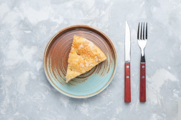 Top view delicious apple pie sliced inside plate on the light desk pie cake sweet sugar bake biscuit