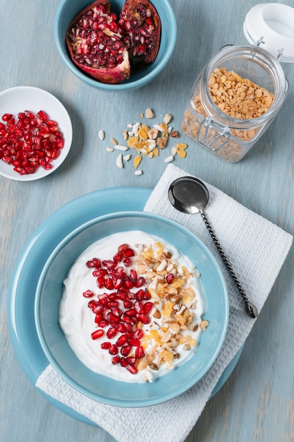 Top view delicious breakfast bowls with yogurt and oats