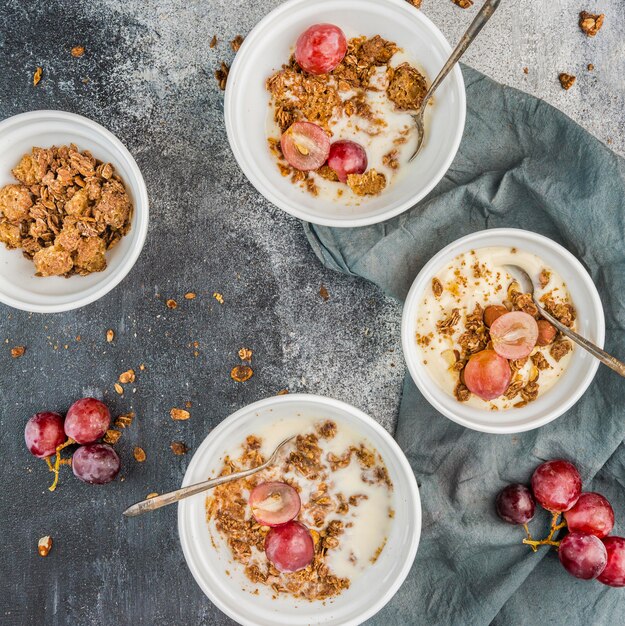 Top view delicious breakfast with granola and milk