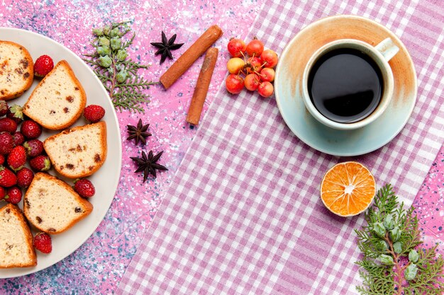 Top view delicious cake slices with fresh red strawberries coffee on pink desk cake bake sweet biscuit color pie sugar