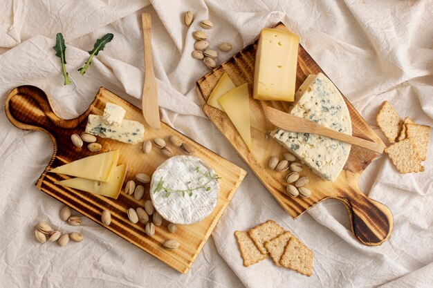 Top view delicious cheeses on a table