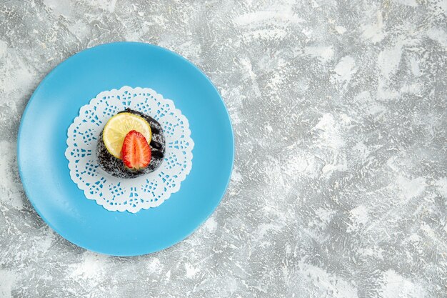 Top view delicious chocolate cake with icing on the white desk chocolate sugar biscuit sweet cake bake