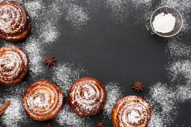 Top view of delicious cinnamon rolls with copy space