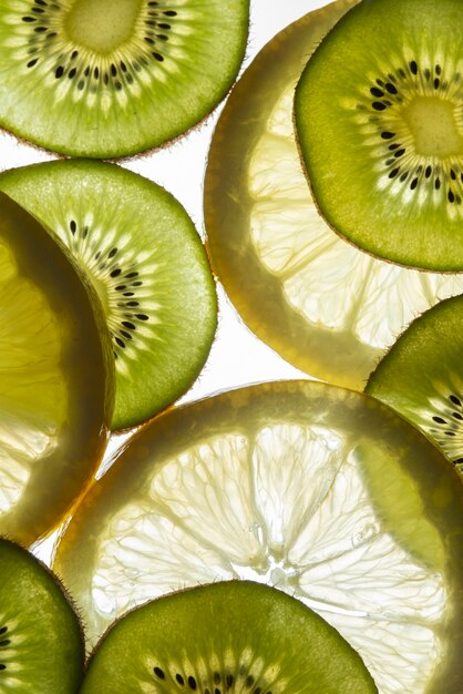 Free photo top view delicious citrus and kiwi