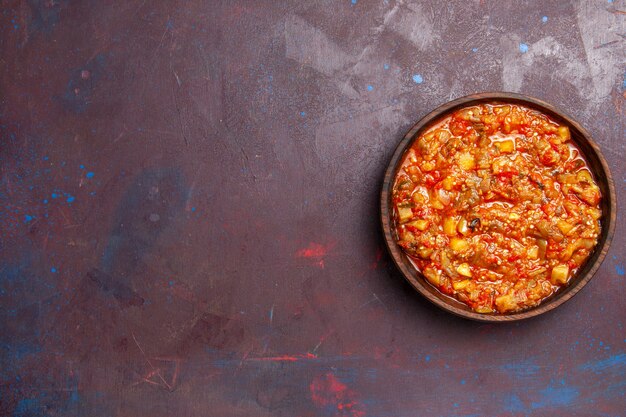 Top view delicious cooked vegetables sliced with sauce on dark background food sauce soup meal vegetable