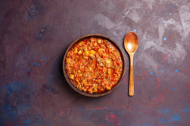 Top view delicious cooked vegetables sliced with sauce on dark background soup sauce meal vegetable food