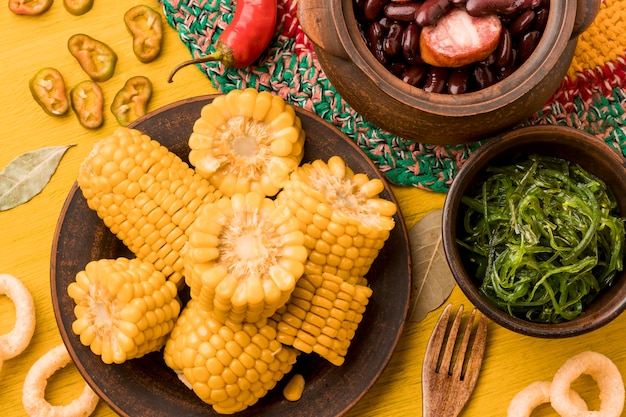 Top view delicious corn on plate