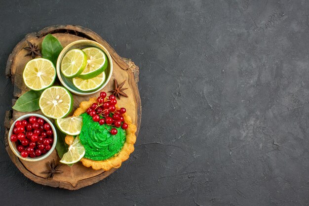 Top view delicious creamy cake with fresh fruits