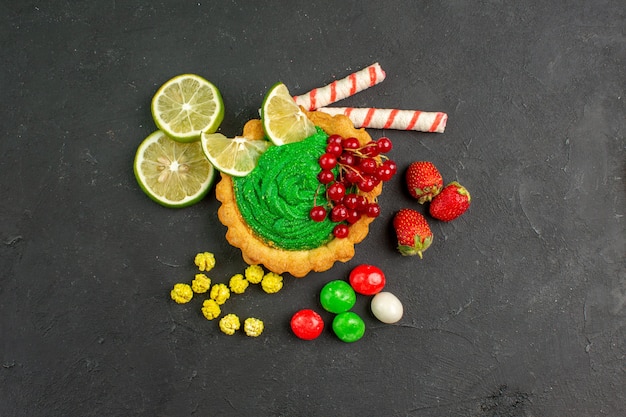 Top view delicious creamy cake with fruits