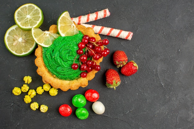 Top view delicious creamy cake with fruits