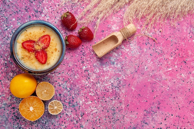 Free photo top view delicious creamy dessert with lemon on light-pink background dessert ice-cream berry cream sweet fruits