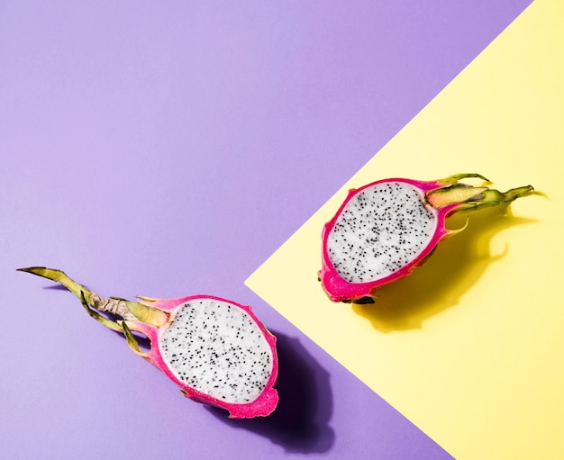 Free photo top view delicious dragon fruit with copy space