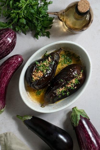 Top view delicious eggplants dish still life